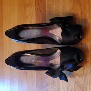 Paris Hilton black patent leather peep-toe heels black satin bow detail. Size 6